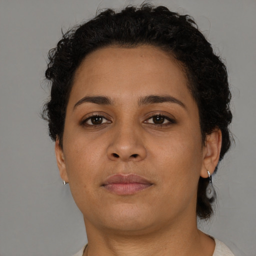 Neutral latino young-adult female with short  brown hair and brown eyes