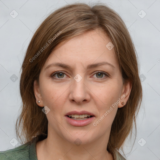 Joyful white young-adult female with medium  brown hair and blue eyes