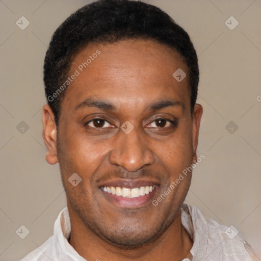Joyful latino young-adult male with short  brown hair and brown eyes