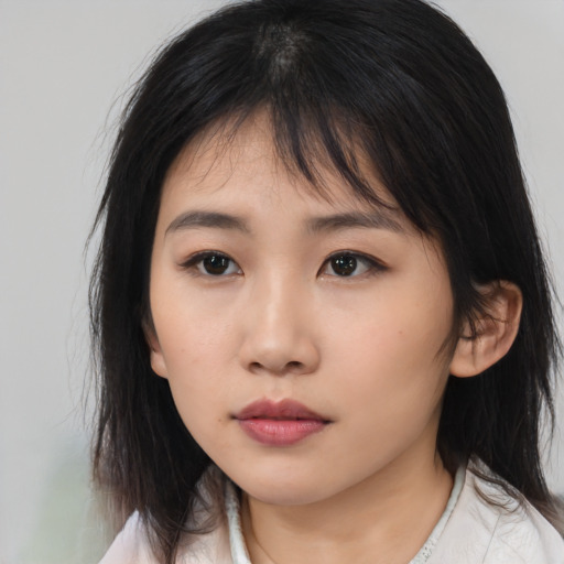 Neutral asian child female with medium  brown hair and brown eyes