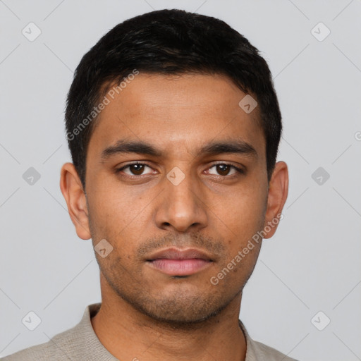 Neutral latino young-adult male with short  brown hair and brown eyes