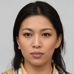 Neutral asian young-adult female with medium  brown hair and brown eyes