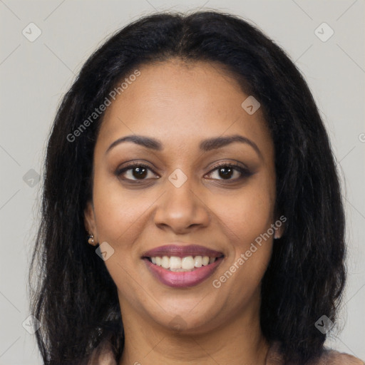 Joyful latino young-adult female with long  brown hair and brown eyes