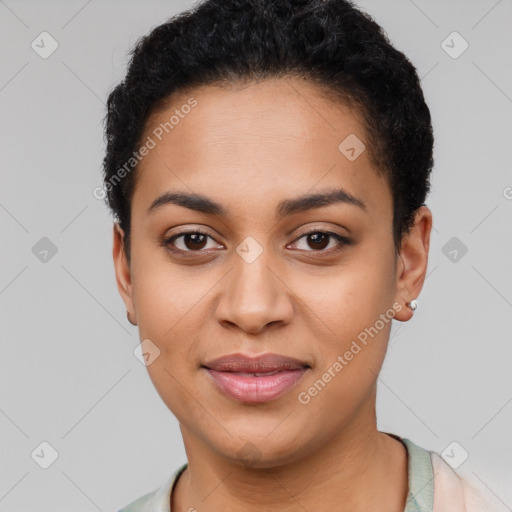 Joyful latino young-adult female with short  black hair and brown eyes