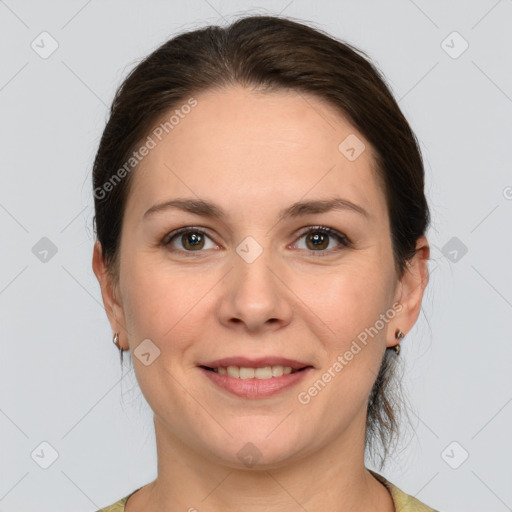 Joyful white young-adult female with medium  brown hair and grey eyes