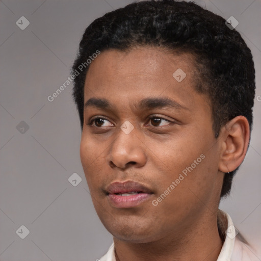 Neutral latino young-adult male with short  black hair and brown eyes