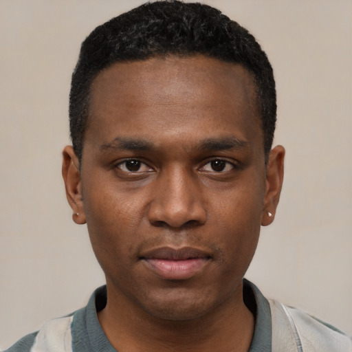 Neutral black young-adult male with short  black hair and brown eyes