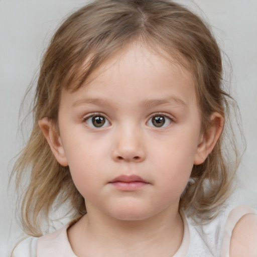 Neutral white child female with medium  brown hair and blue eyes