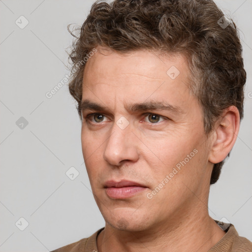 Neutral white adult male with short  brown hair and brown eyes