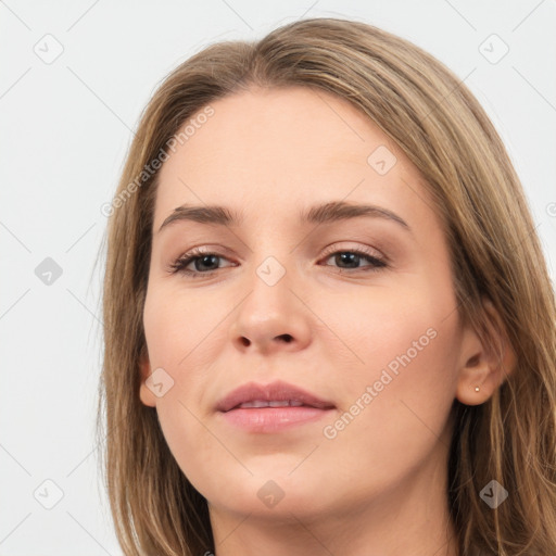 Neutral white young-adult female with long  brown hair and brown eyes