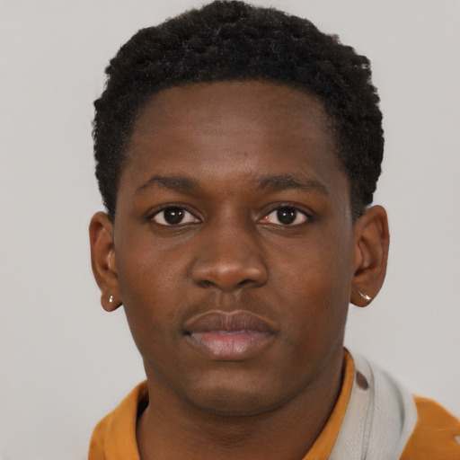 Neutral black young-adult male with short  brown hair and brown eyes