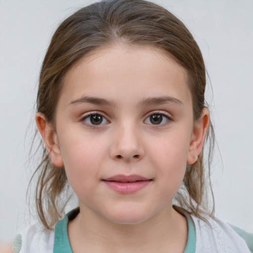 Joyful white child female with medium  brown hair and grey eyes