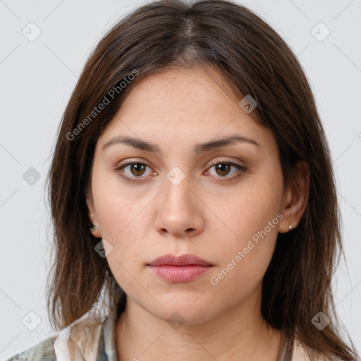 Neutral white young-adult female with medium  brown hair and brown eyes