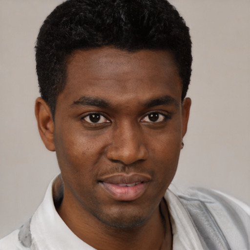 Neutral black young-adult male with short  brown hair and brown eyes