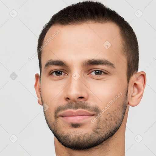 Neutral white young-adult male with short  brown hair and brown eyes