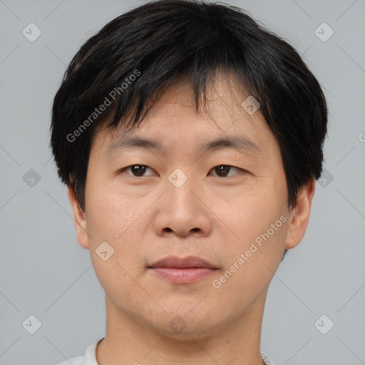 Neutral asian young-adult male with short  brown hair and brown eyes