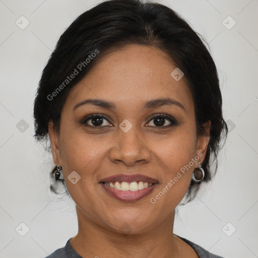 Joyful black young-adult female with medium  brown hair and brown eyes