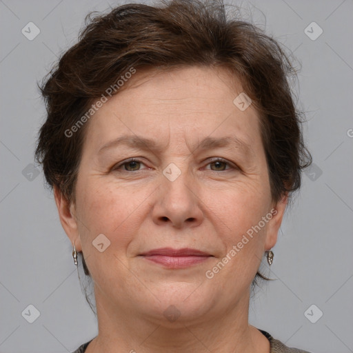 Joyful white adult female with short  brown hair and grey eyes