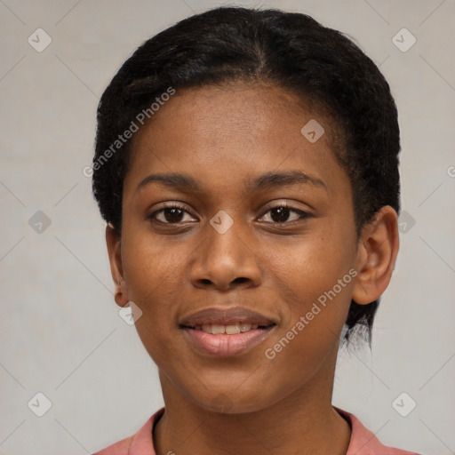 Joyful black young-adult female with short  black hair and brown eyes