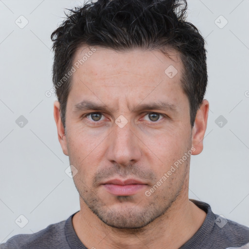 Neutral white adult male with short  brown hair and brown eyes