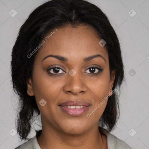 Joyful black young-adult female with medium  brown hair and brown eyes