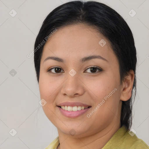 Joyful asian young-adult female with medium  brown hair and brown eyes