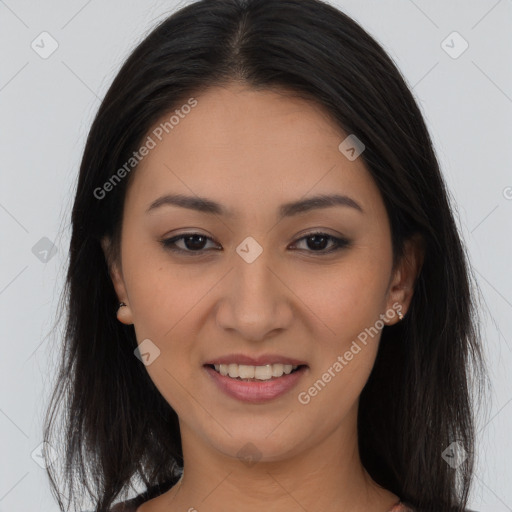 Joyful asian young-adult female with long  brown hair and brown eyes