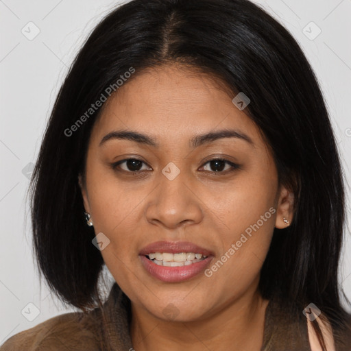 Joyful latino young-adult female with medium  brown hair and brown eyes