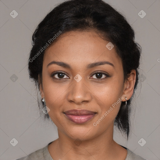 Joyful black young-adult female with medium  black hair and brown eyes