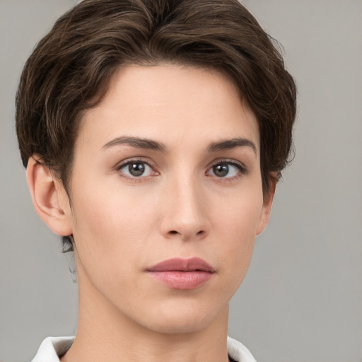 Neutral white young-adult female with short  brown hair and brown eyes