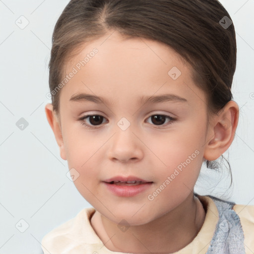 Joyful white child female with short  brown hair and brown eyes