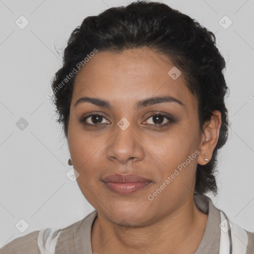 Joyful latino young-adult female with short  brown hair and brown eyes