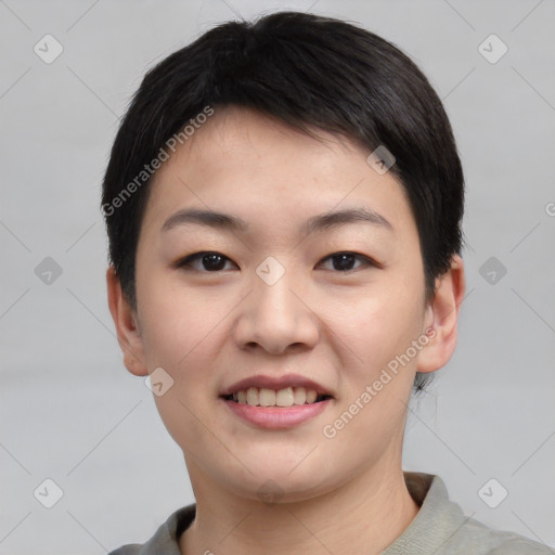 Joyful asian young-adult female with short  black hair and brown eyes