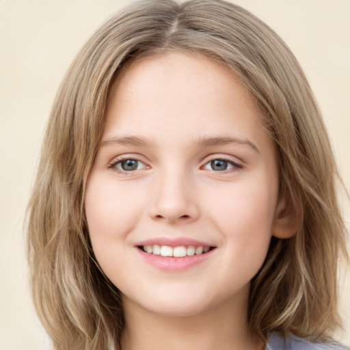 Joyful white child female with medium  brown hair and grey eyes