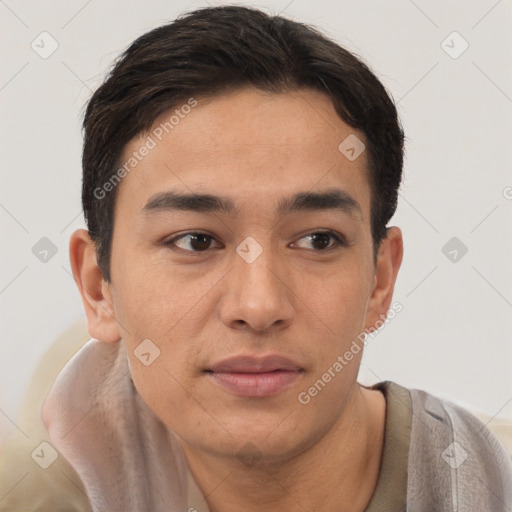 Joyful latino young-adult male with short  brown hair and brown eyes