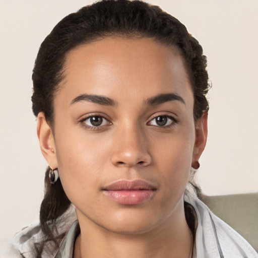 Neutral white young-adult female with short  brown hair and brown eyes