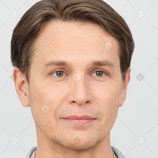 Joyful white adult male with short  brown hair and grey eyes