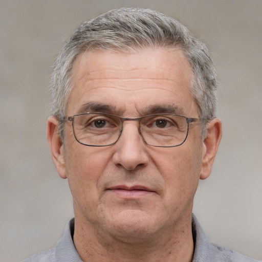 Neutral white middle-aged male with short  gray hair and brown eyes