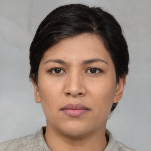 Neutral asian young-adult female with short  brown hair and brown eyes