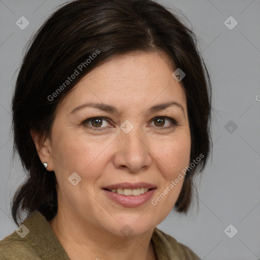 Joyful white adult female with medium  brown hair and grey eyes