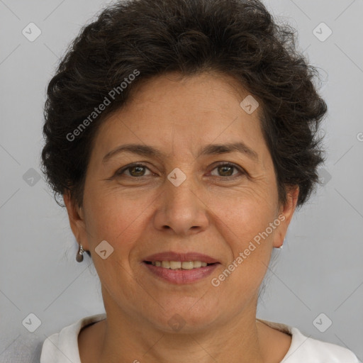 Joyful white adult female with short  brown hair and brown eyes