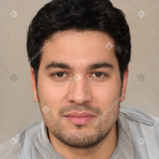 Joyful white young-adult male with short  black hair and brown eyes