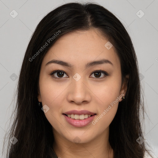 Joyful latino young-adult female with long  brown hair and brown eyes