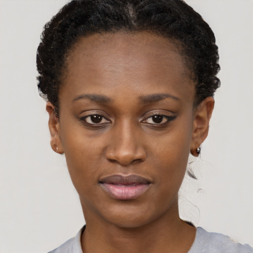 Neutral black young-adult female with short  brown hair and brown eyes