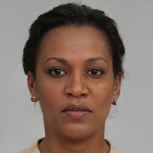 Neutral black young-adult female with short  brown hair and brown eyes