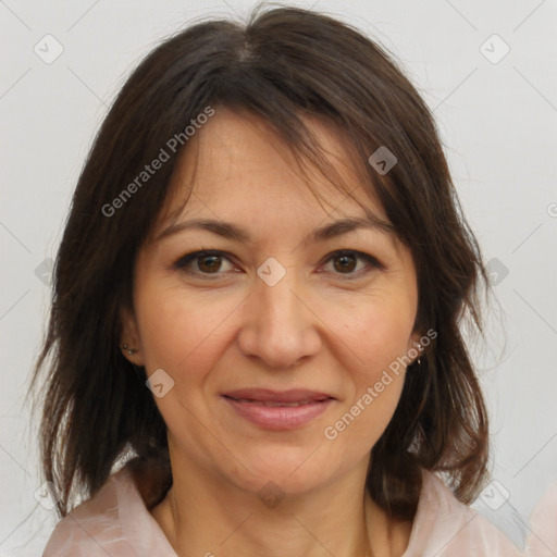 Joyful white adult female with medium  brown hair and brown eyes