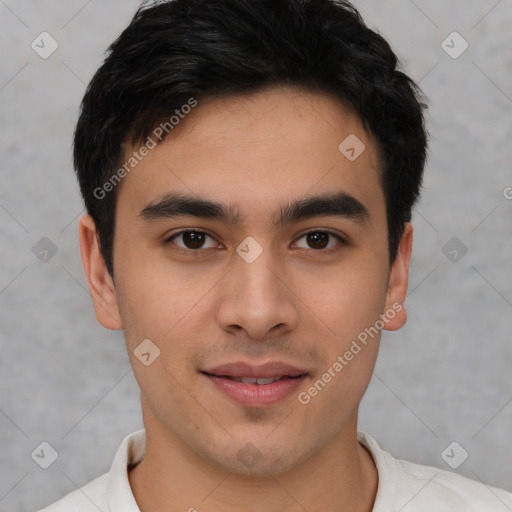 Joyful asian young-adult male with short  brown hair and brown eyes