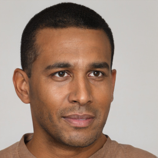 Neutral latino young-adult male with short  brown hair and brown eyes