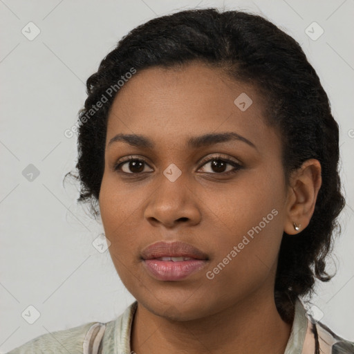 Joyful black young-adult female with medium  black hair and brown eyes