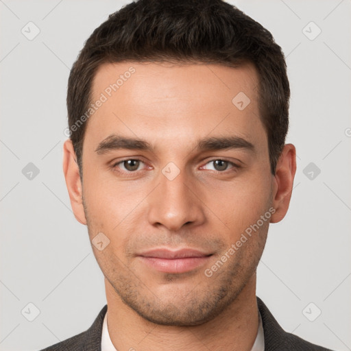 Neutral white young-adult male with short  brown hair and brown eyes